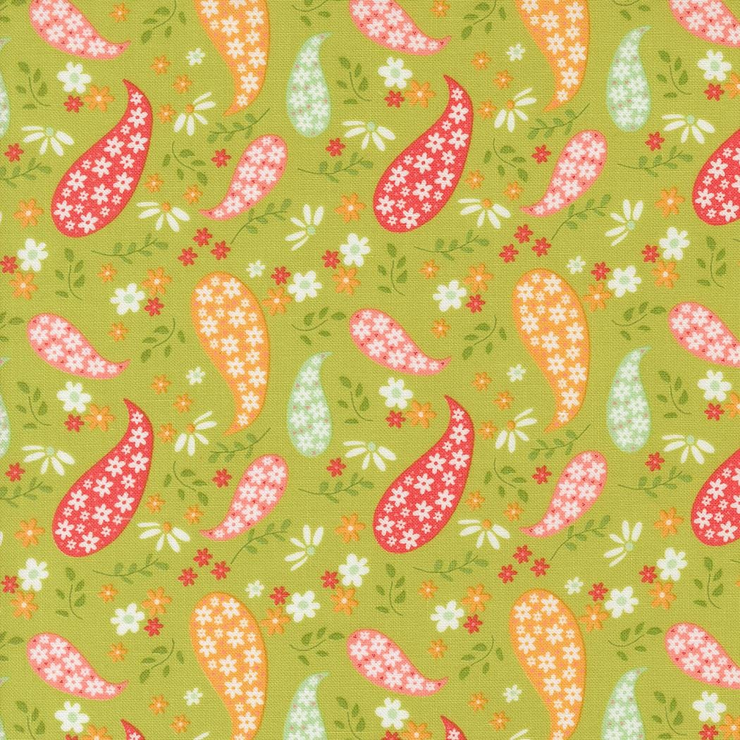 a close up of a green background with flowers