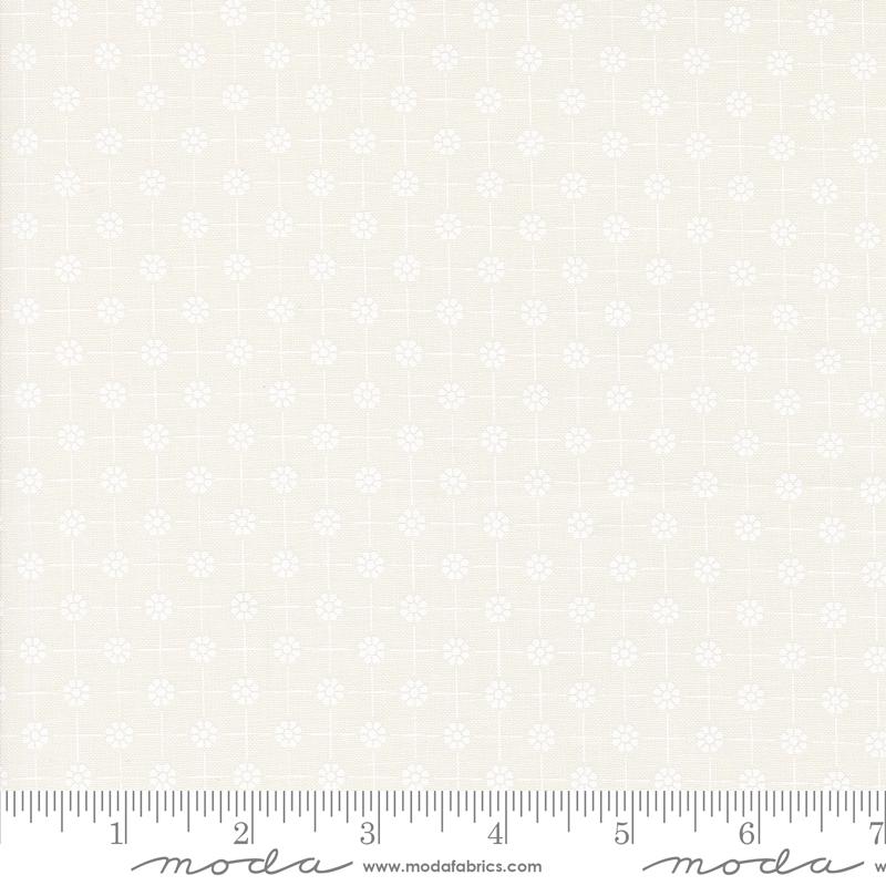 a ruler with a white flower pattern on it