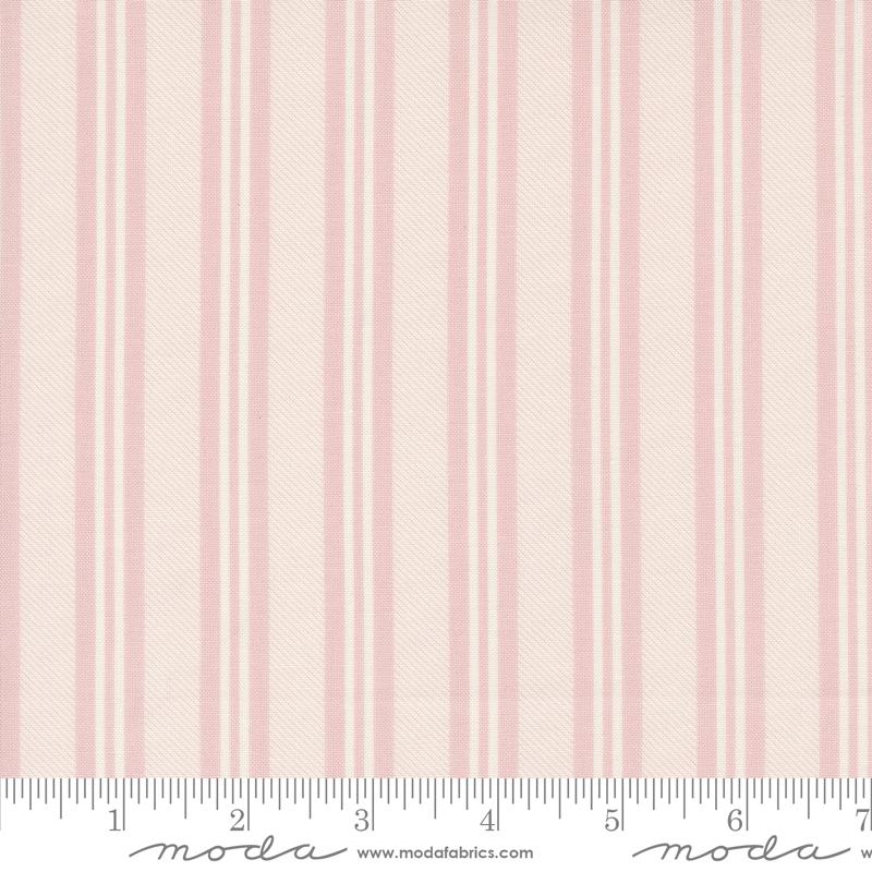 a pink and white striped wallpaper with a ruler