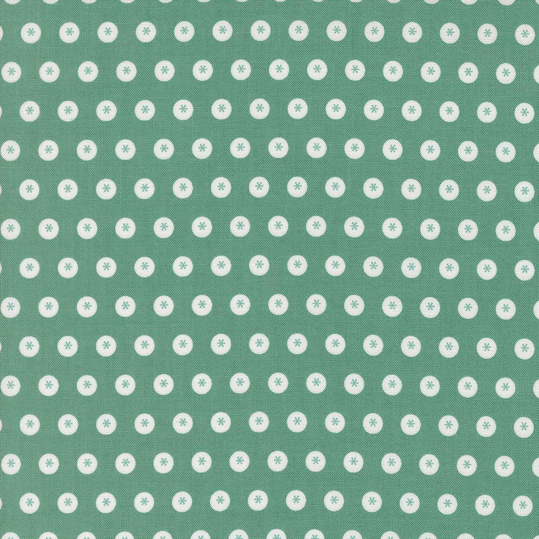 a green background with white dots
