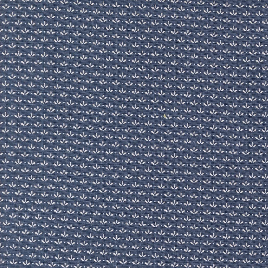 a blue background with white leaves on it