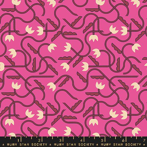 a pink and brown pattern with arrows on it