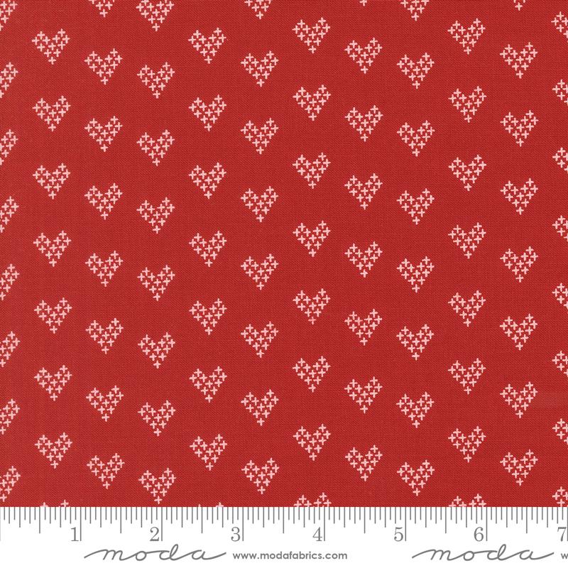 a red background with white hearts on it