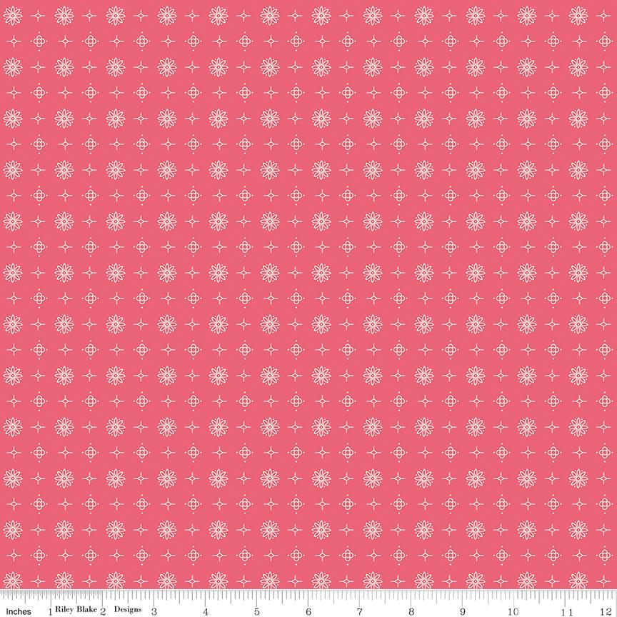a pink background with white dots