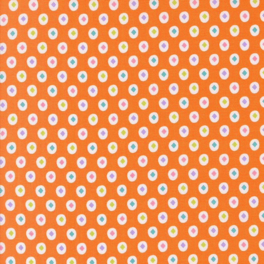 a repeating pattern of small white and orange circles on an orange background.