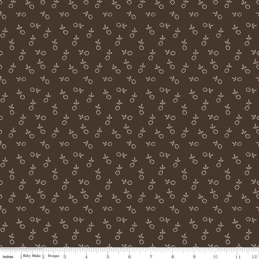 a repeating pattern of small white flowers or leaves on a dark brown background.
