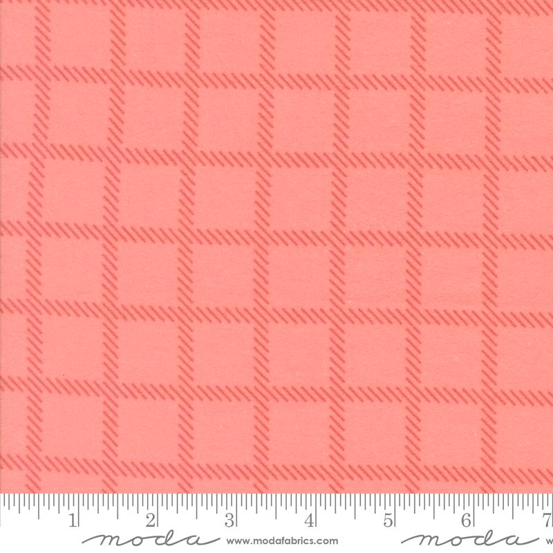 The image is a close-up of a fabric with a repeating pattern of red squares arranged in a grid-like fashion.