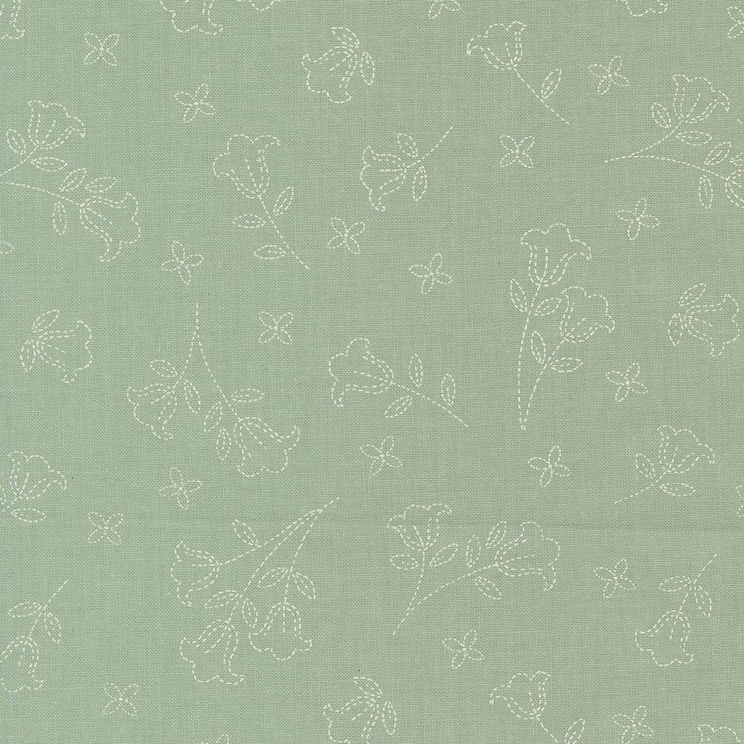 a repeating pattern of white flowers and leaves on a light green background.