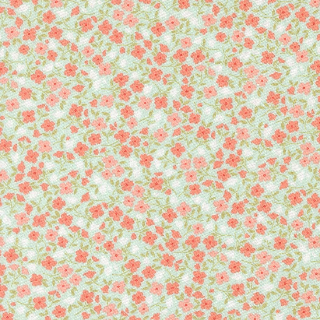 a repeating pattern of small pink and white flowers on a light green background.