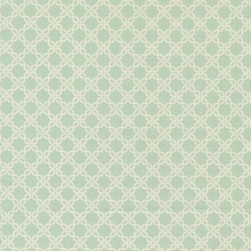 a repeating pattern of white and light green diamond shapes arranged in a grid-like fashion.