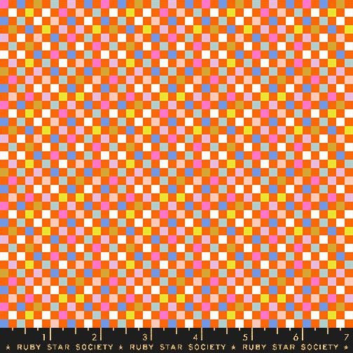 The image is a vibrant and colorful pattern composed of numerous small squares in various shades of orange, pink, yellow, and blue. The pattern appears to be a mosaic or a repeating design, creating a visually striking and dynamic composition.