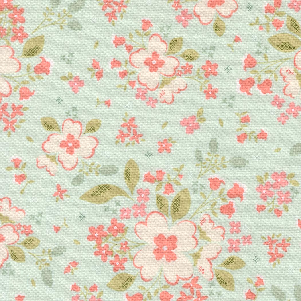 a repeating floral pattern with pink and white flowers and green leaves against a light green background.