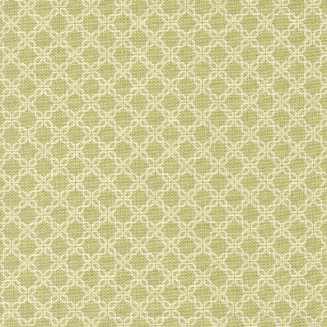 a repeating pattern of white and green geometric shapes, creating a visually striking and symmetrical design.
