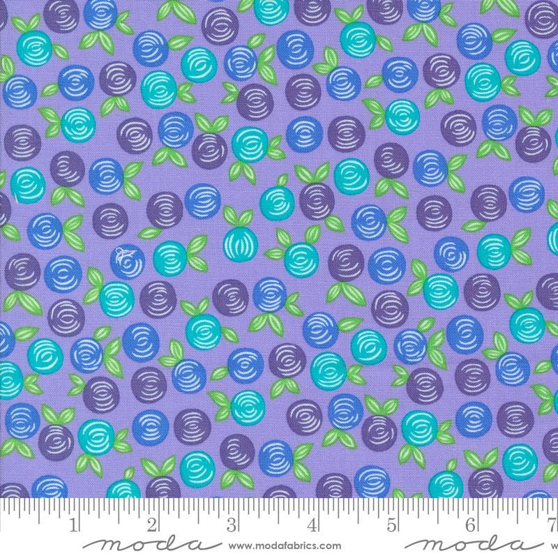 a pattern of blue and green roses on a purple background.