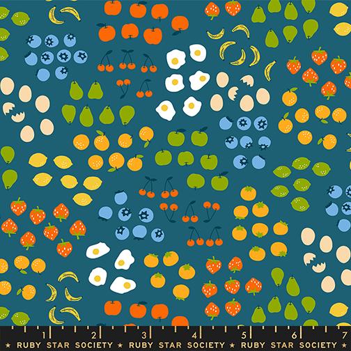 The image is a vibrant collage of various fruits and vegetables, including bananas, apples, oranges, pears, and strawberries, all set against a blue background.