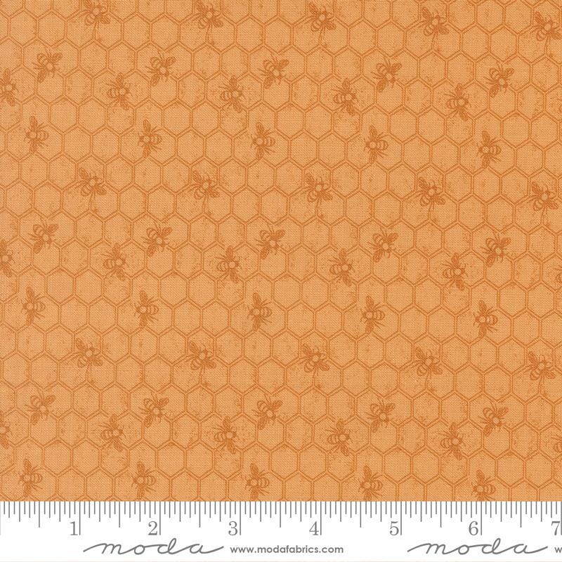 a repeating pattern of honeycomb-like shapes in shades of orange and brown, with small bee-like figures scattered throughout the pattern.