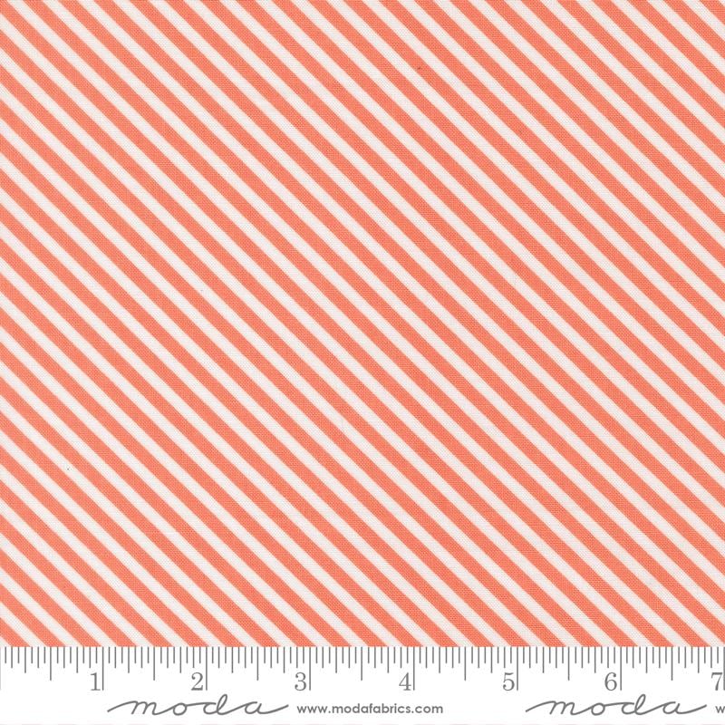 a repeating pattern of diagonal stripes in shades of orange and white.