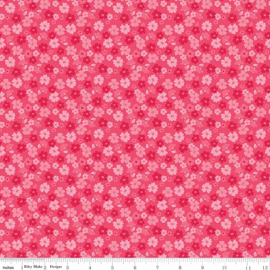 The image is a repeating pattern of pink flowers on a red background.