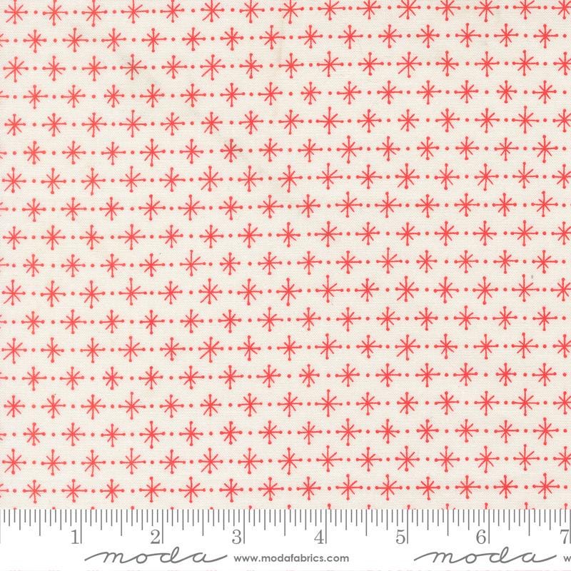 a repeating pattern of red dots and lines on a cream-colored background.