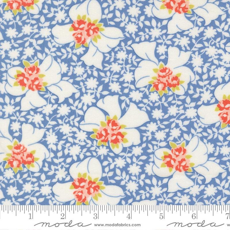 a blue floral pattern with white flowers and leaves.