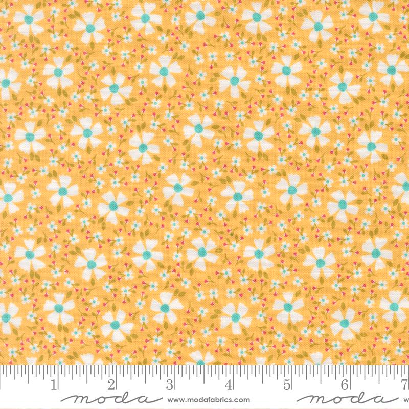The image is a fabric with a repeating pattern of yellow flowers and leaves on a light orange background.