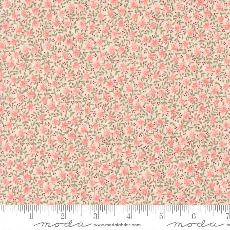 The image is a fabric with a floral pattern, featuring small pink flowers and leaves. The fabric appears to be a light-colored material, possibly beige or cream, with a repeating pattern of pink flowers and green leaves. The image does not contain any text or additional objects, and the focus is on the floral pattern.