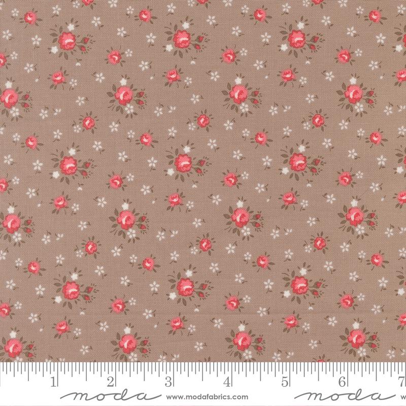a fabric with a floral pattern of red flowers and white flowers. The fabric appears to be a neutral-colored material, possibly beige or brown, with the red flowers and white flowers scattered throughout the pattern. The image does not contain any text or additional objects, and the focus is solely on the floral pattern.
