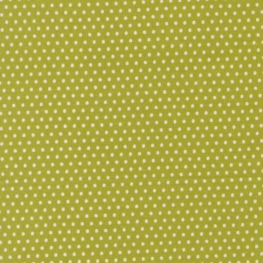 a repeating pattern of green polka dots on a light green background.