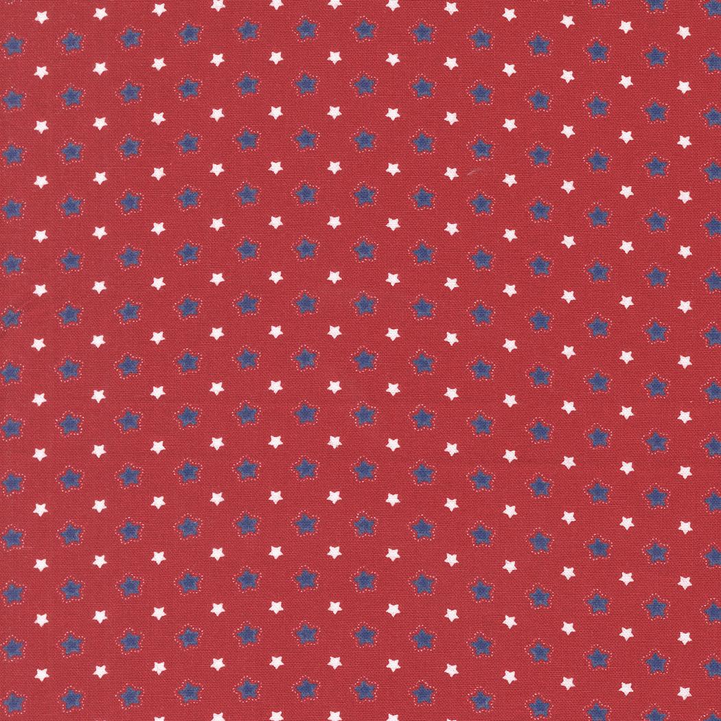 a red background with white stars scattered across it.