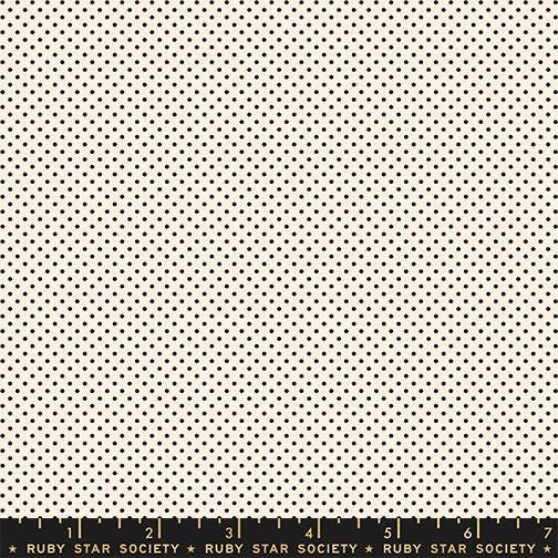 The image is a repeating pattern of small black dots on a cream-colored background.