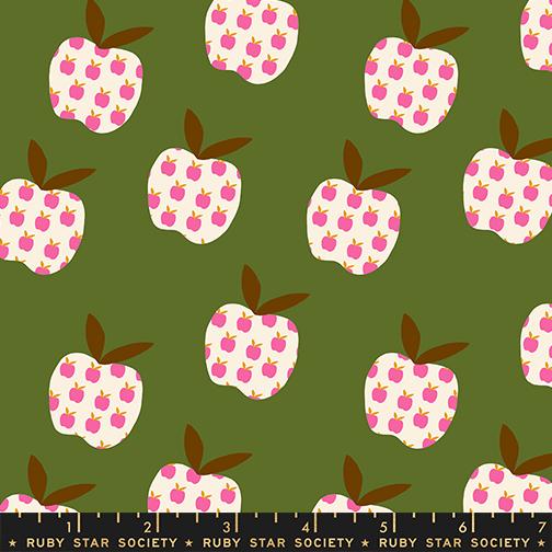 a repeating pattern of pink and white apples against a green background.