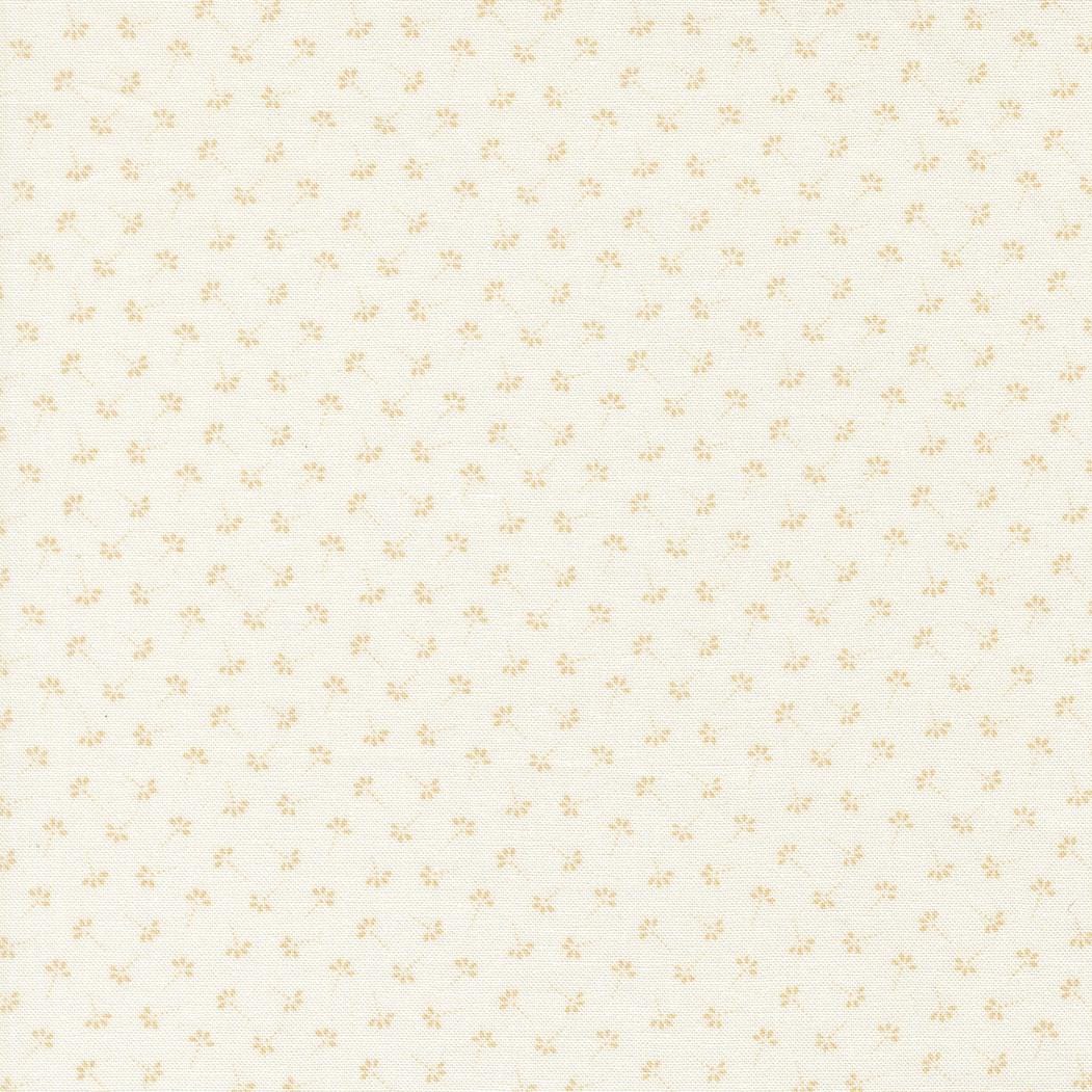 a repeating pattern of small yellow flowers or leaves on a light-colored background.