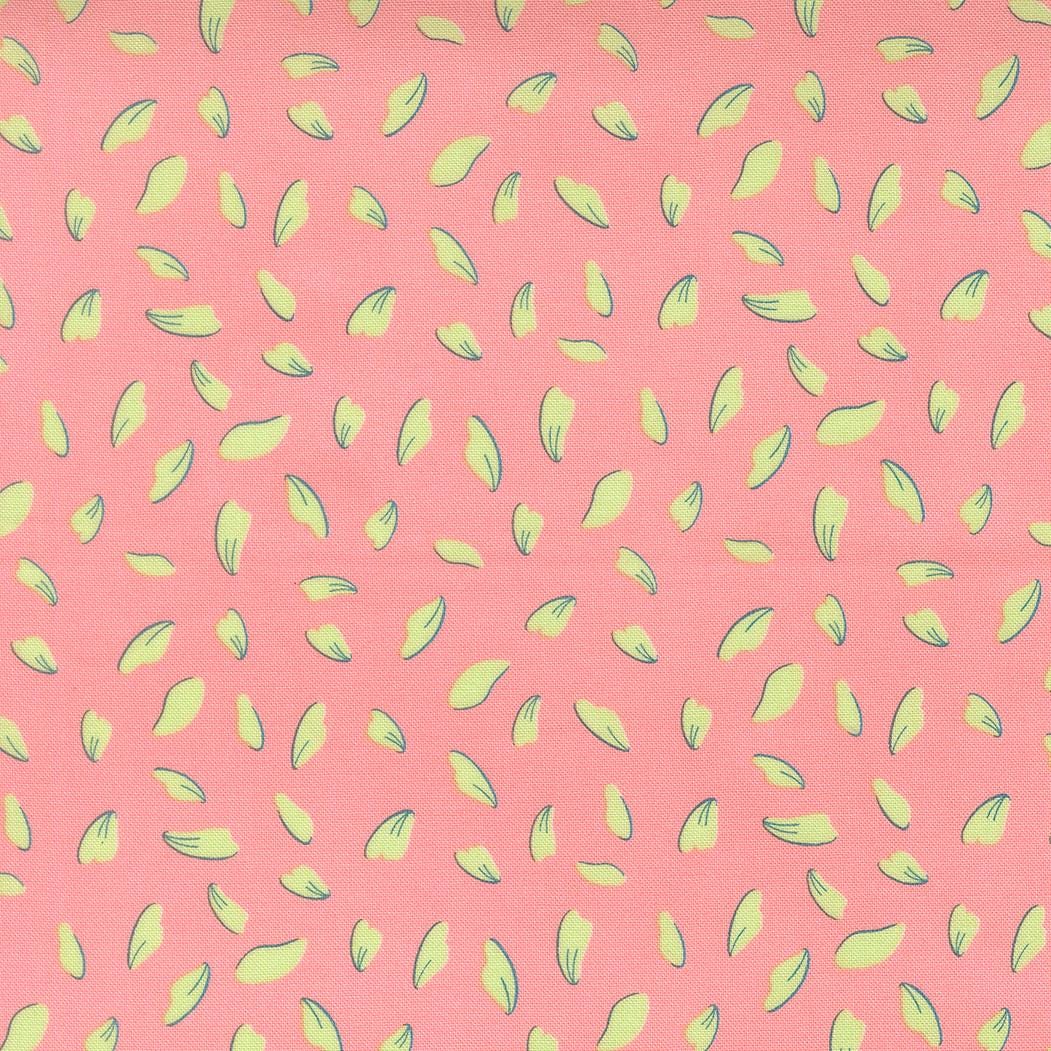 a pattern of pink and yellow leaves scattered across a pink background.