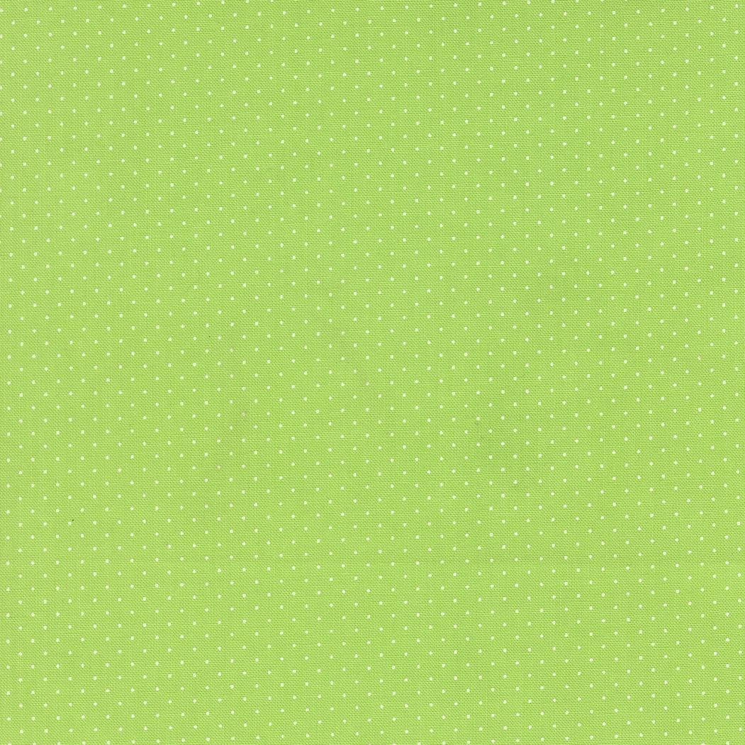 The image is a repeating pattern of small white dots on a bright green background.