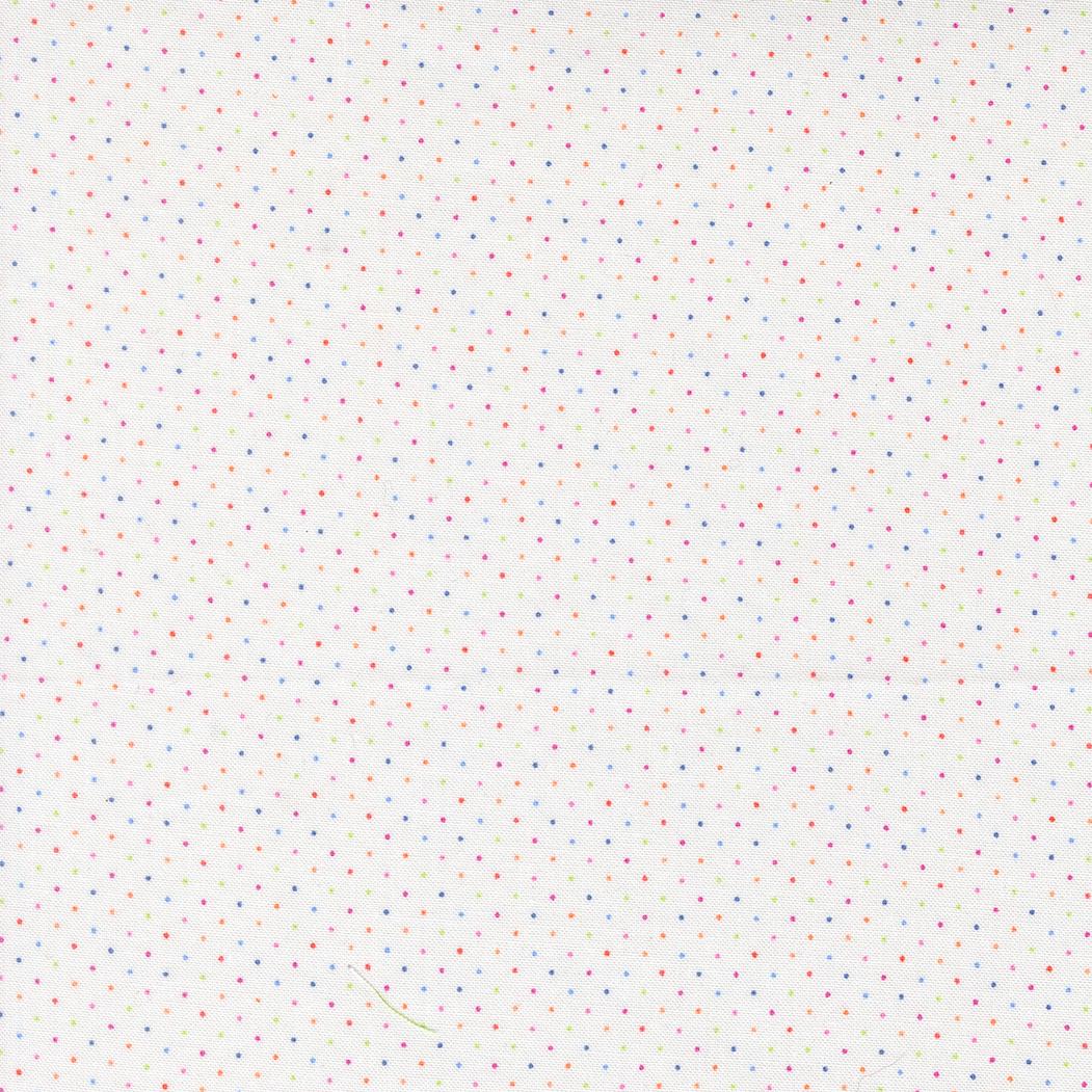 The image is a white background with small, multicolored dots or stars scattered across it, creating a playful and whimsical appearance.