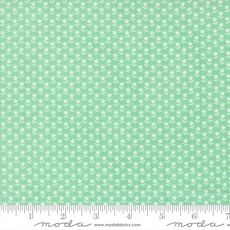 The image is a repeating pattern of small white flowers or leaves on a light green background.