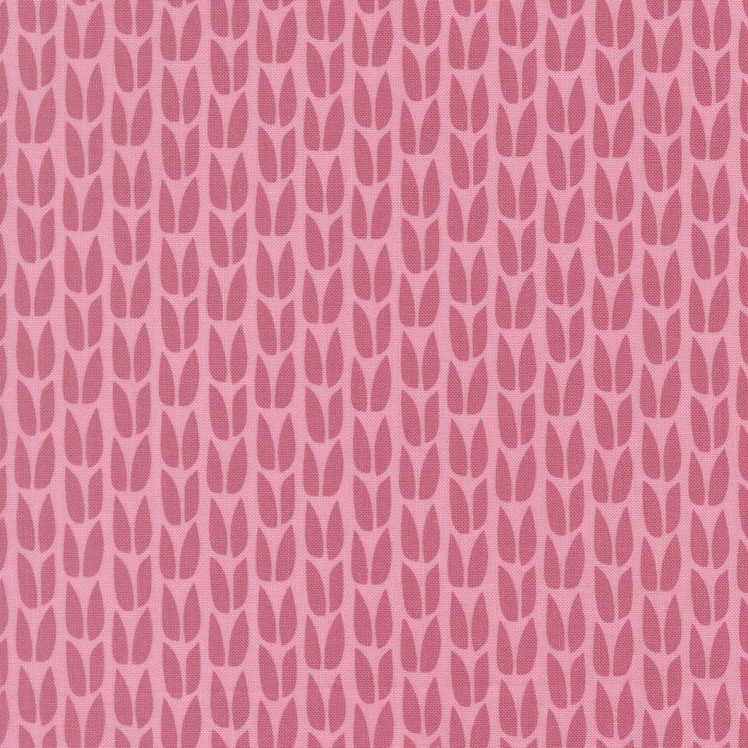 a repeating pattern of pink leaves on a pink background.