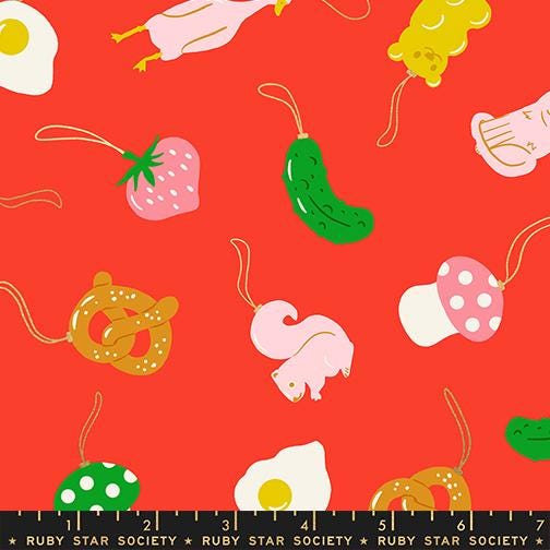 various colorful and whimsical objects, including a strawberry, a pickle, a mushroom, a pretzel, a squirrel, and a donut, all set against a bright red background.