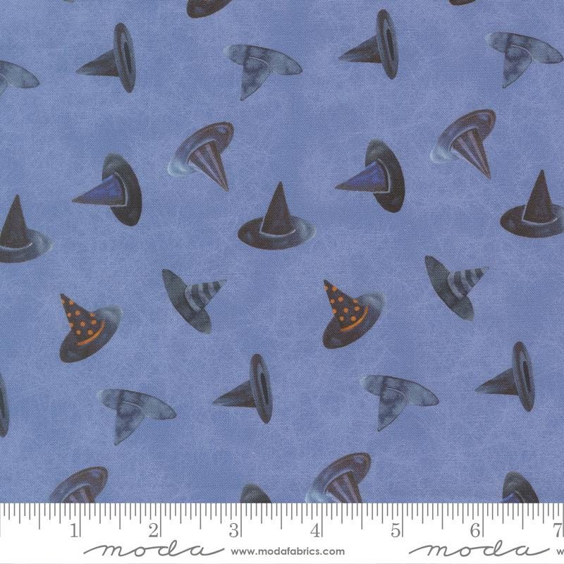 a repeating pattern of witch hats in various shades of blue against a dark blue background.