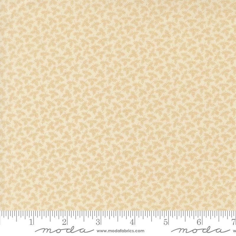 The image is a fabric with a repeating pattern of small yellow flowers or leaves.