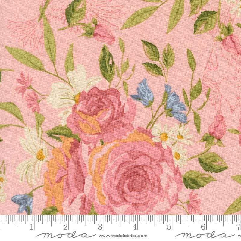 a close-up view of a vibrant floral print with pink roses, white daisies, and green leaves against a pink background.