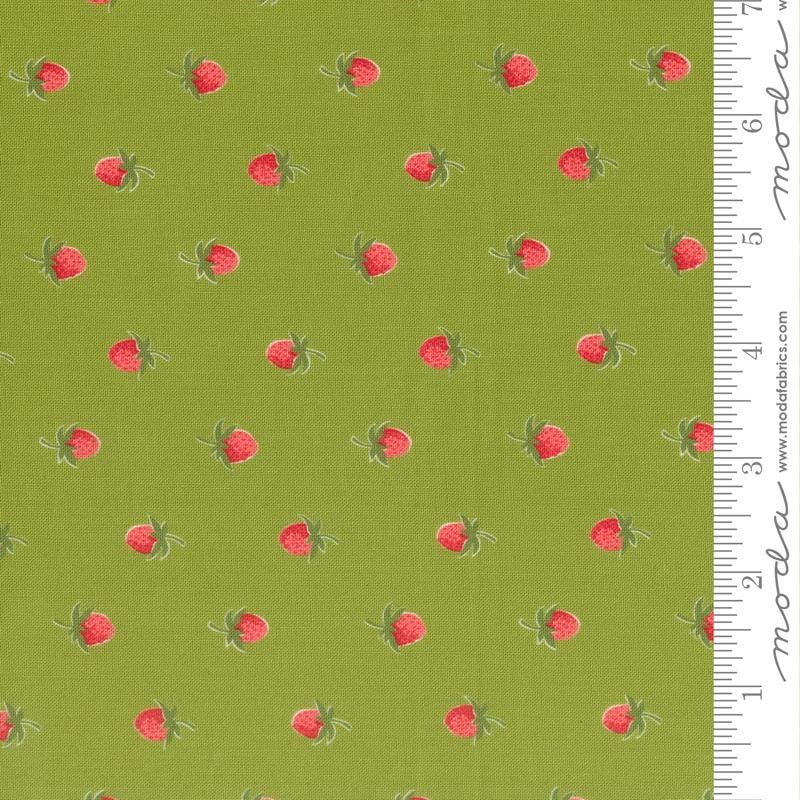 a repeating pattern of red strawberries on a green background.