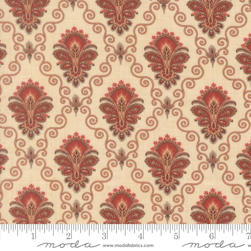 a repeating pattern of red and beige floral designs with intricate swirls and shapes, creating a visually striking and decorative fabric.