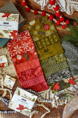 Yuletide Treats Quilt Kit features Old World Yuletide by Fancy That Design House Fabrics for the quilt top, backing and Pattern 52 x 61