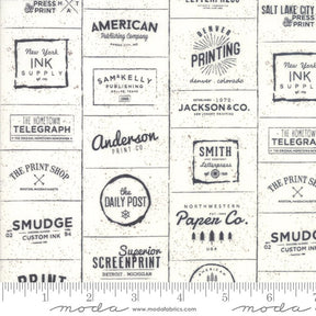 The Print Shop Cream and Black Logos Yardage 5740-23 Sold in 1/2 yard increments cut continuously