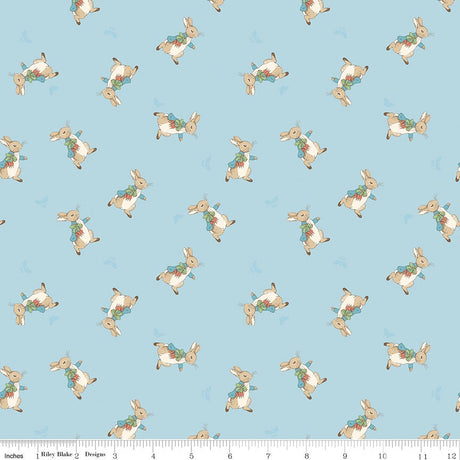 The Tale of Peter Rabbit Blue Peter Toss C14702-Blue Fabrics Sold in 1/2 Yard Increments