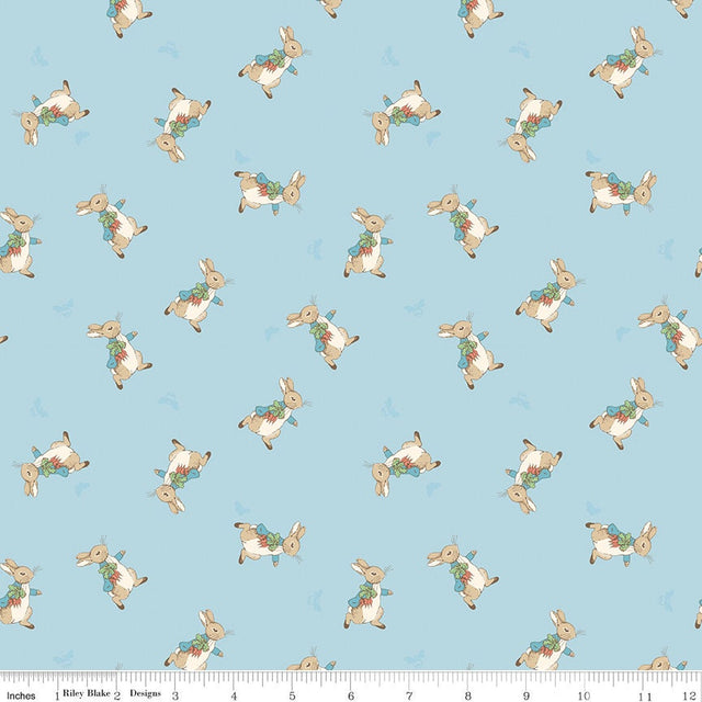 The Tale of Peter Rabbit Blue Peter Toss C14702-Blue Fabrics Sold in 1/2 Yard Increments