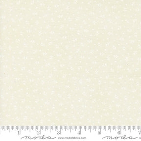 a ruler with a white flower pattern on it