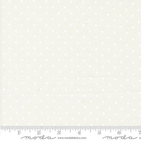 a ruler with white polka dots on it