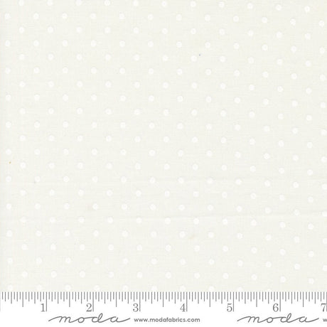 a ruler with white polka dots on it